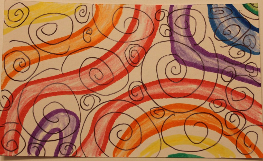 Abstract line drawing of colored paths in separate rainbow colors overlaid with ink spirals.