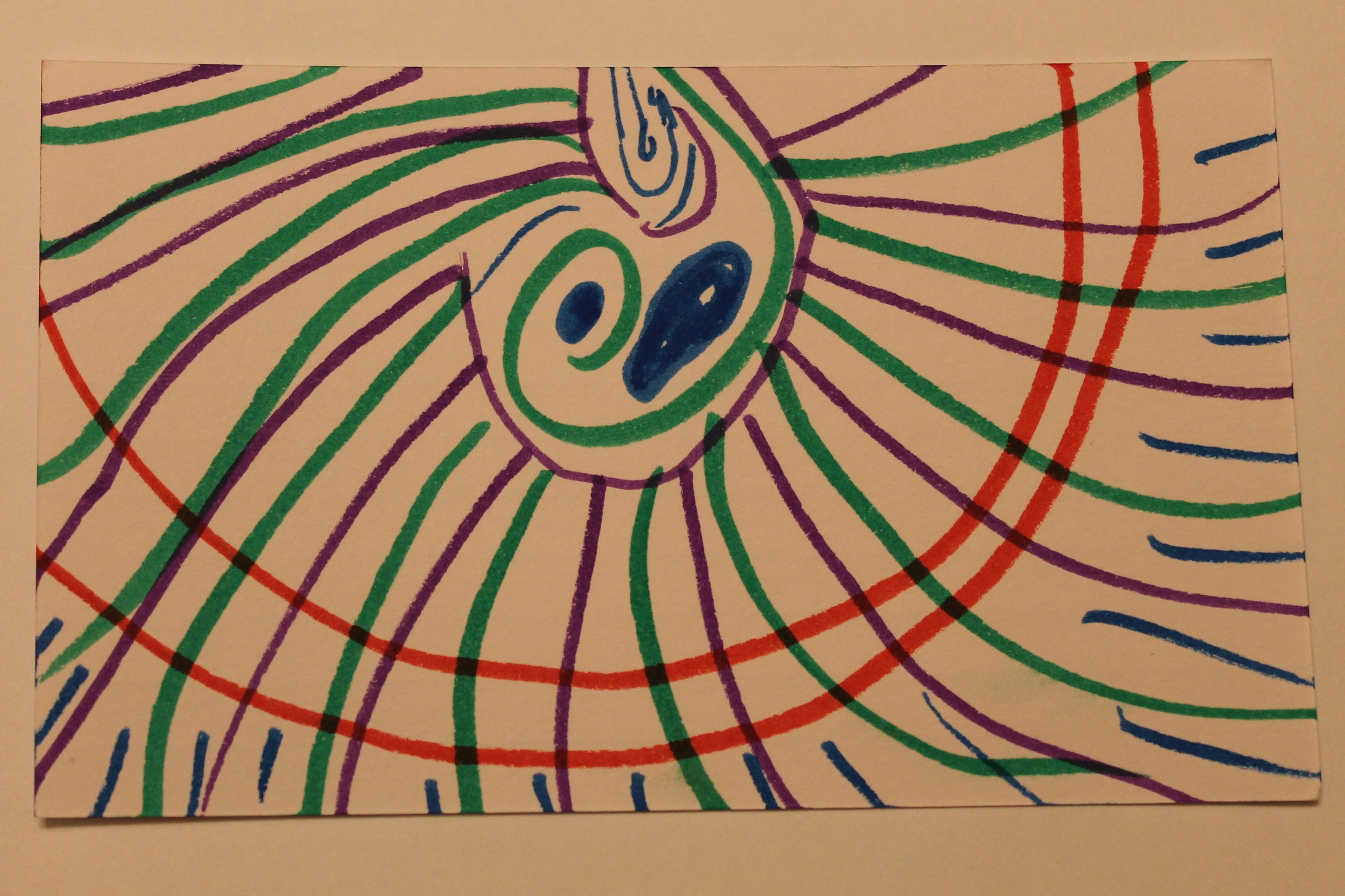 Abstract drawing of green and purple marker lines radiating out from a spiralish center, bisected by two orange circular arcs.