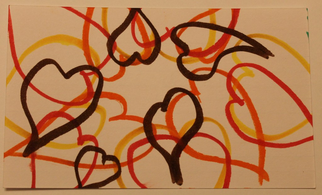 Marker hearts in fall colors all around the center.