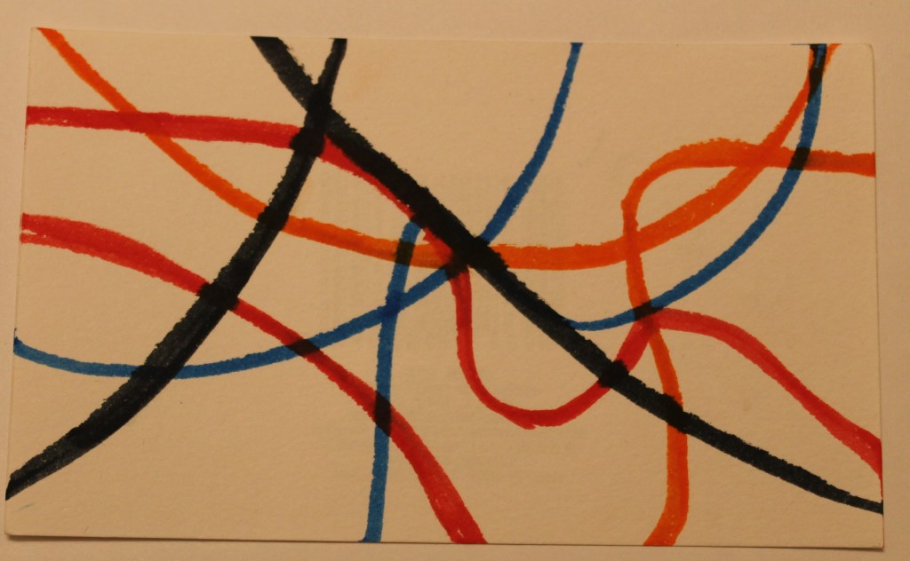 Colored lines crossing the image in curves of orange, black, red and blue.