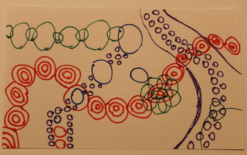 Abstract image made of circles, featuring the images resembling a tentacle and a necklace.