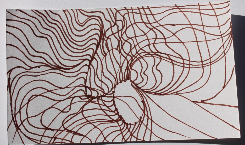 Abstract image of brown wavy lines suggesting hair or waves.