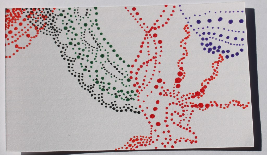 Abstract image made of colored dots in different sizes with shapes suggesting lace, and tentacles.

